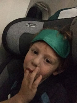 Jacob resting with his Aer Lingus eye mask