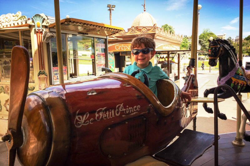 Riding a carousel in Paris, France #Paris #France #carousel #travel #familytravel #travelwithkids