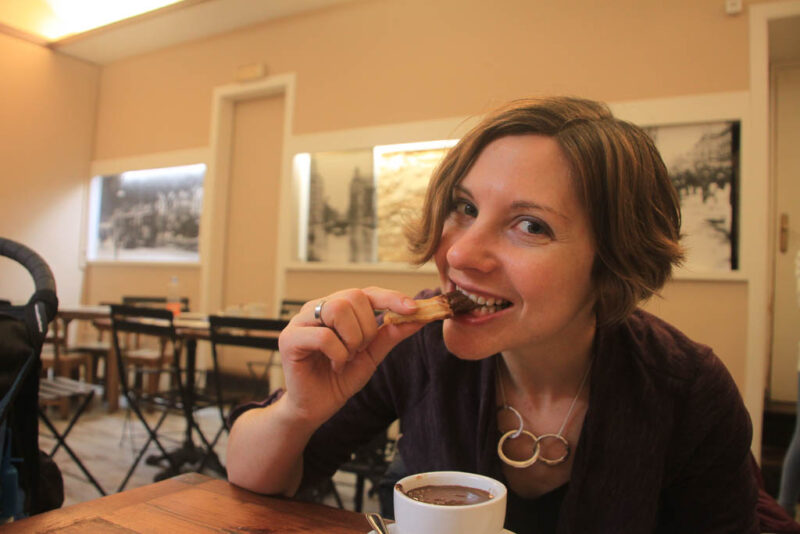 eating churros con chocolate in Spain