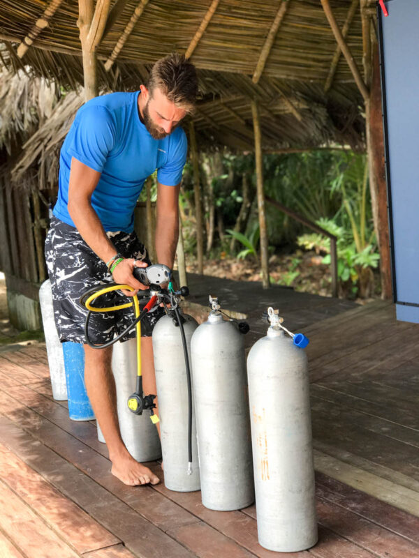 Prepping for a dive from the Zapatillas Dive Center at Al Natural, Bocas del Toro all-inclusive