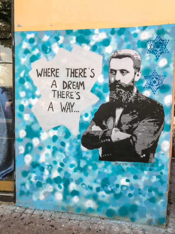 where to go in Tel Aviv with kids - explore street art like this Theodore Herzl mural