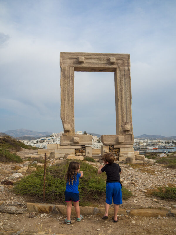 There are so many things to do on Naxos with kids, including checking out the ancient Portara. #Naxos #Greece