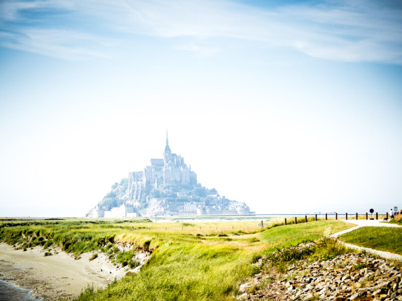 Stunning Mont St Michel rising out of the mist in Normandy, France. #Normandy #Brittany #France #travel #travelphoto