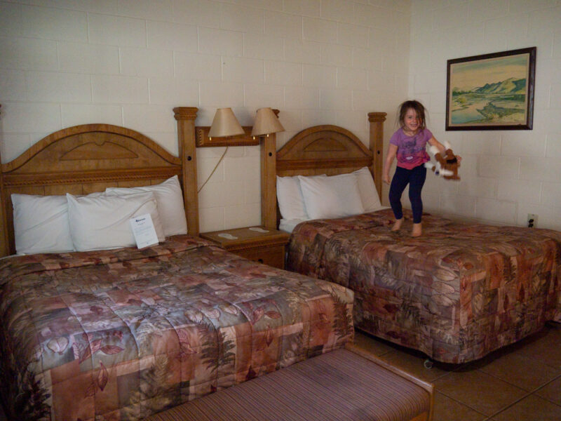 Rio Grande room at Chisos Mountain Lodge showing two beds with lamps in between