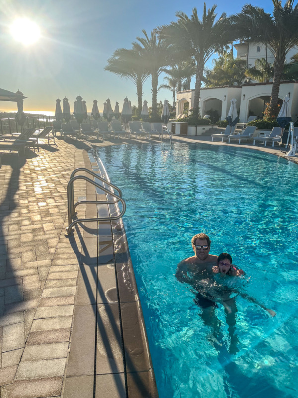 where to stay in San Diego with kids - Park Hyatt Aviara - father and daughter in pool