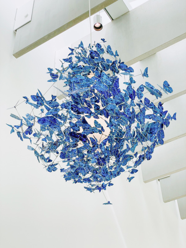 blue modern glass art hanging sculpture at Corning Museum of Glass - things to do in Finger Lakes with kids