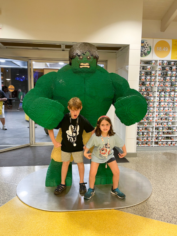 Hulk sculpture at LEGO store in Disney Springs, Orlando with tweens